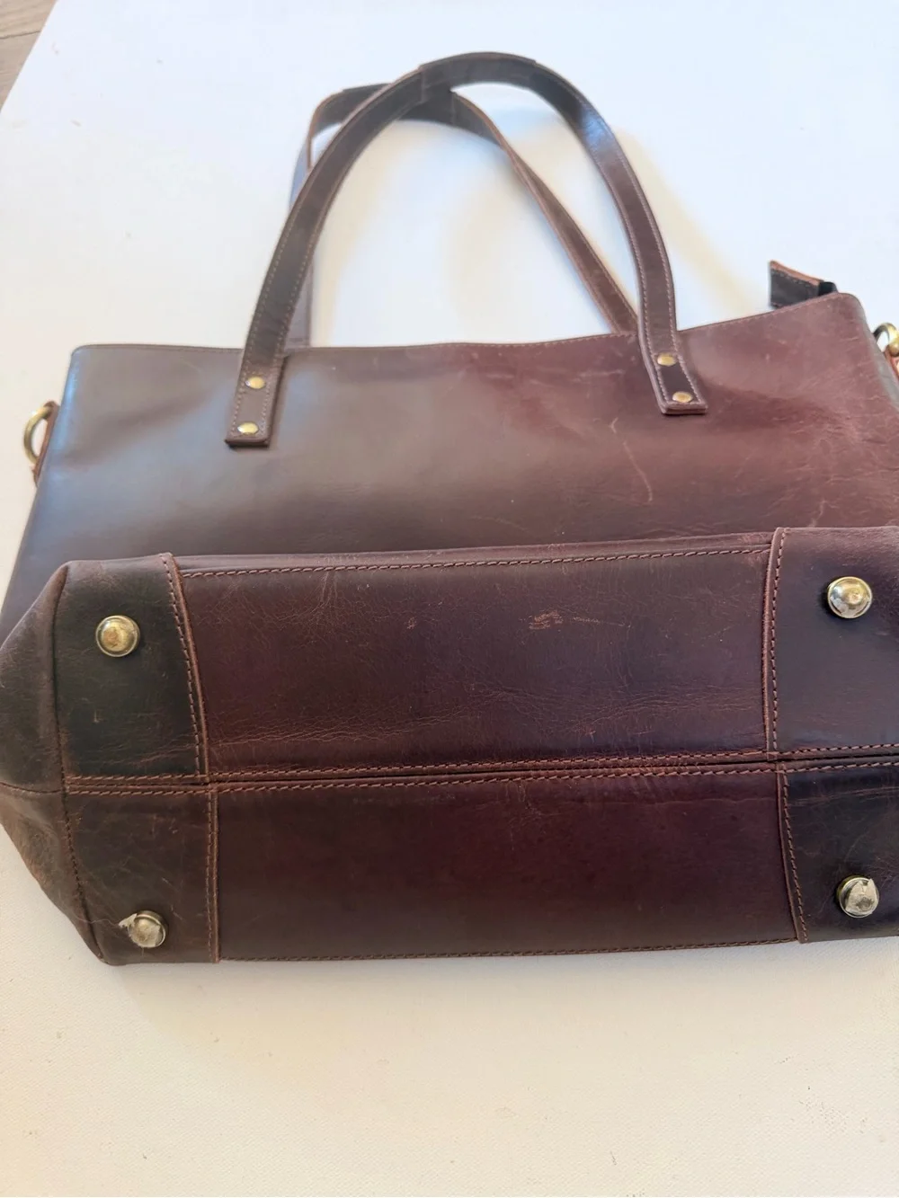 Brown leather messenger bag